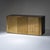 Three-door sideboard with an elegant brass front featuring stepped corners and a burl veneer body. The interior is fitted...