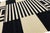 Textile Modern Navajo Style Hand-Woven Wool Flat-Weave Area Rug in Black & Ivory For Sale - Image 7 of 9