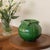 Beautiful vintage ceramic vase from France, 1960s. Stunning shiny green glaze with spiral handles and cushion detailing on...