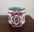 A lovely English majolica jardinière with amethyst foliate scroll on white with gorgeous turquoise glaze interior. Marked...