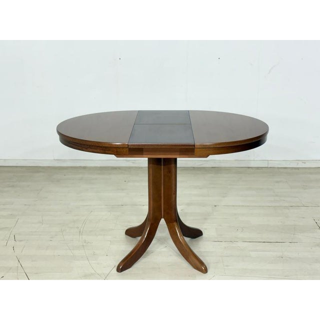 For sale is this beautiful, round dining table, distinguished by its timeless design and high-quality craftsmanship. The...