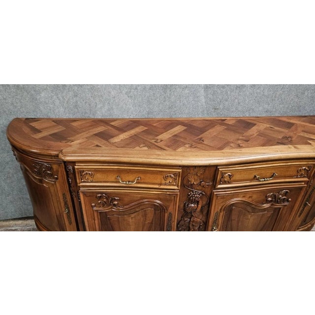 Louis xv style sideboard with putto - curved front - richly carved - marquetry top dimensions: h 108 x w 247 x d 61 cm...