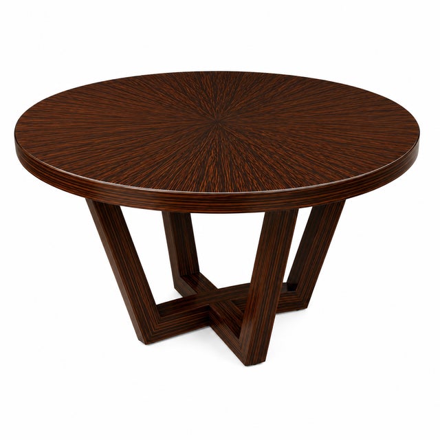 Modern round dining table table. The table is made of oak with a custom finish. The table measures 54” in dia The table is...