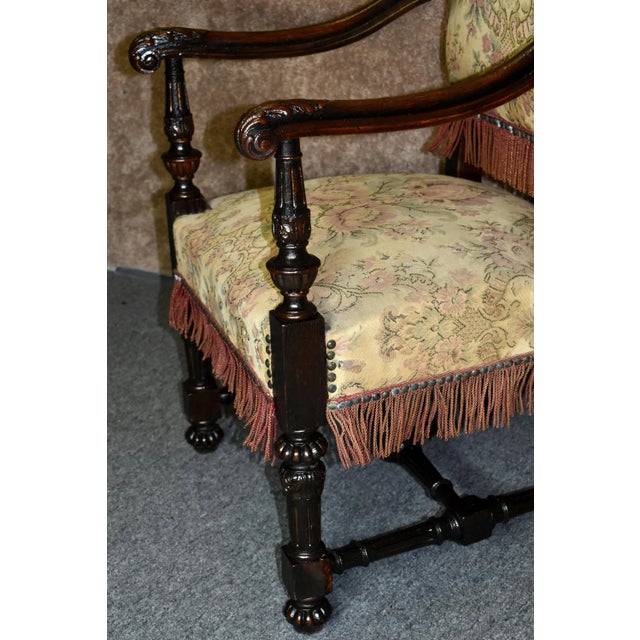 Wood Antique Carved Oak Armchair 1920s Tudor Style High Back Fringe Stretcher Base For Sale - Image 7 of 13