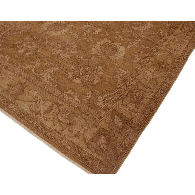 A Persian influenced Turkish hand knotted rug made by skilled artisans capable of creating the most exceptional vegetable...