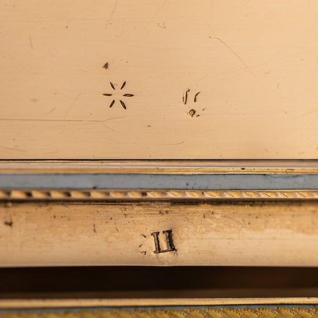 Antique 18th century german 18k gold & hand painted enamel snuff box. Of rectangular shape with angled corners, this...