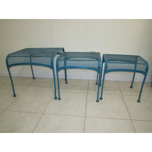 These 1980s Nesting Patio Garden Metal Wire Side Tables come in a set of 3 in a lovely blue color. The tables are designed...