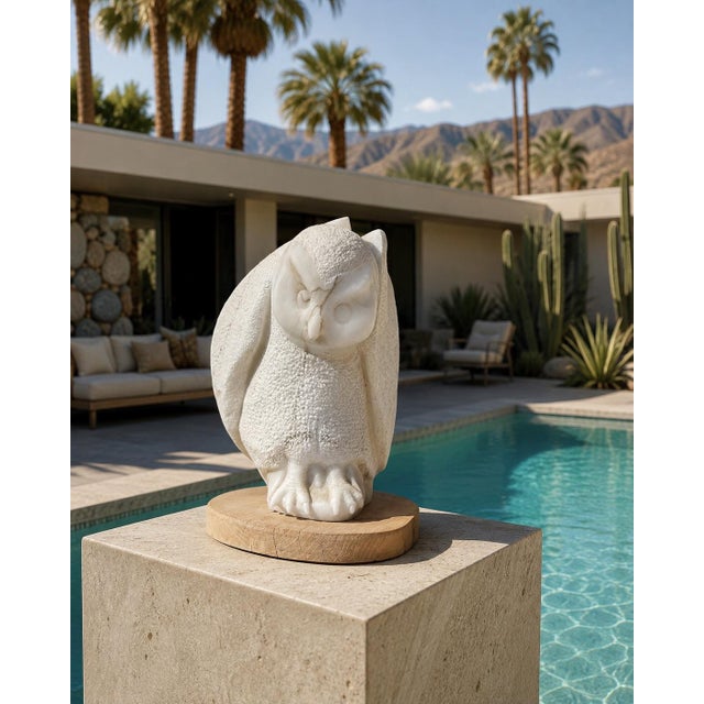 A substantial hand-carved marble owl sculpture by listed Taos, New Mexico artist Frank McGuire (b. 1938), whose work...