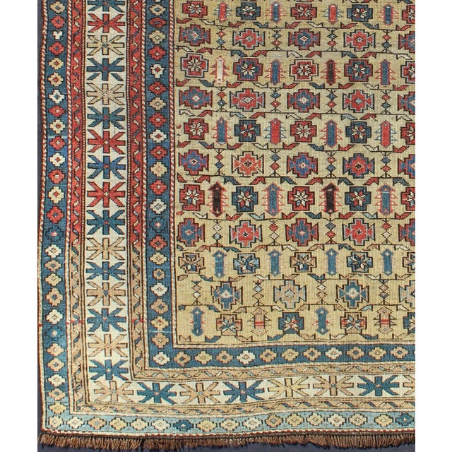 Antique Kuba rug with all-over geometric ornament design in multi-colors. Keivan Woven Arts / rug S12-0617, country of...