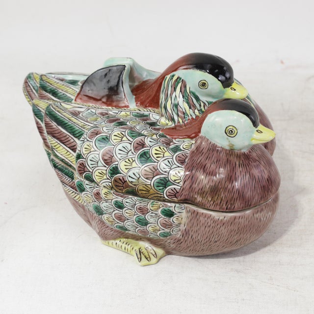 This exceptional vintage Chinese porcelain covered bowl is masterfully sculpted into the form of a nesting pair of...