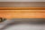 A Chow leg coffee table with waisted and carved apron and natural wood patina. This vintage Chow leg coffee table,...