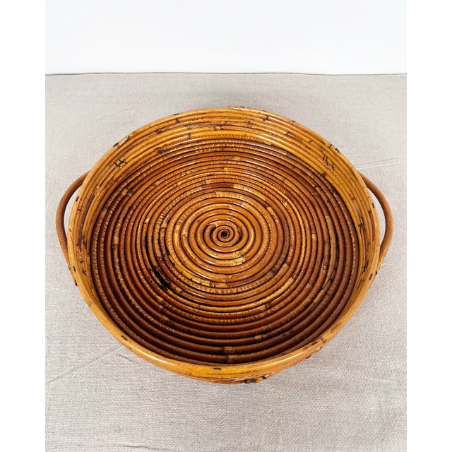 Vintage pencil reed rattan round tray. Spiraling pencil reed tray with handles. Add a warm natural touch to any room.