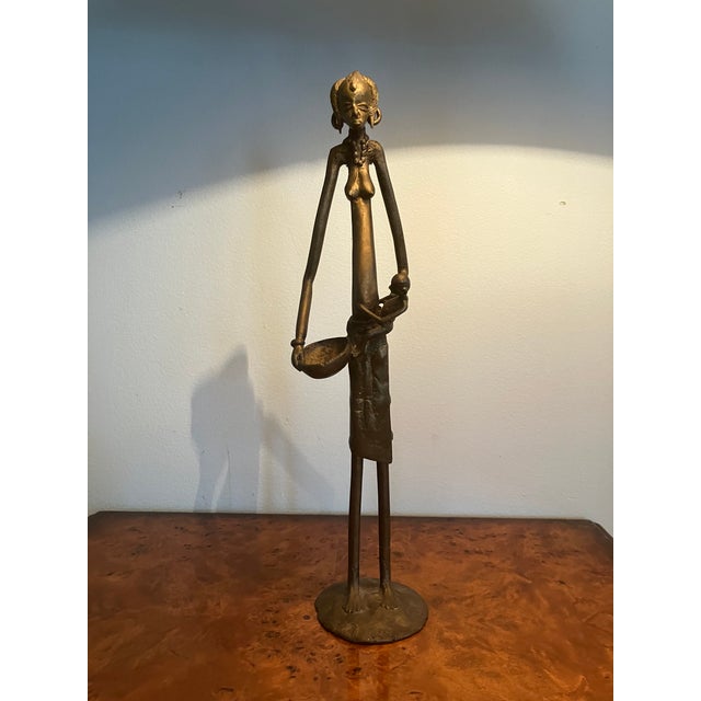 Derme Morou: 1940-2000. Famous African sculptor from Upper Volta now Burkina Faso. He used the lost wax method for...