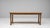 This 1900s French oak dining table features a beautifully understated design that highlights the natural character and...