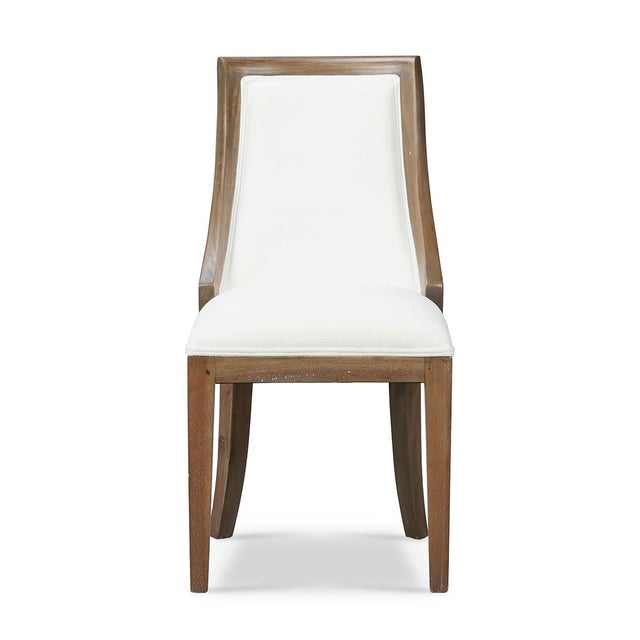 Crafted with a solid mahogany frame in a Straw Wash finish, this chair exudes rustic elegance. The gently curved back...