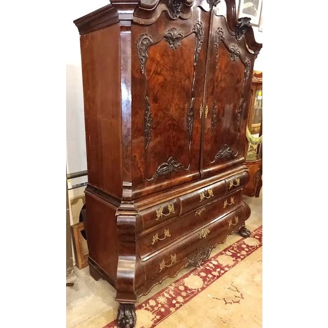 18th Century Dutch Figured Walnut Linen Press with Desk Interior. Masterfully constructed piece which dates from the...