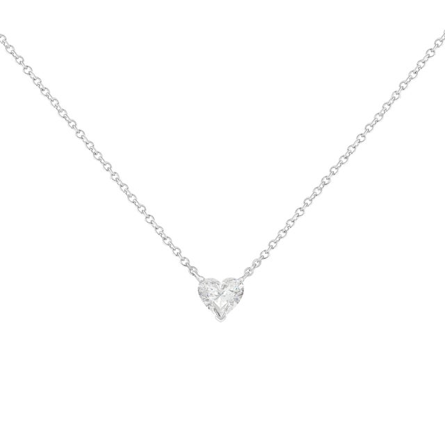 An elegant heart-shaped lab grown diamond is the brilliant focal point of this solitaire necklace for her. Set in 14K...