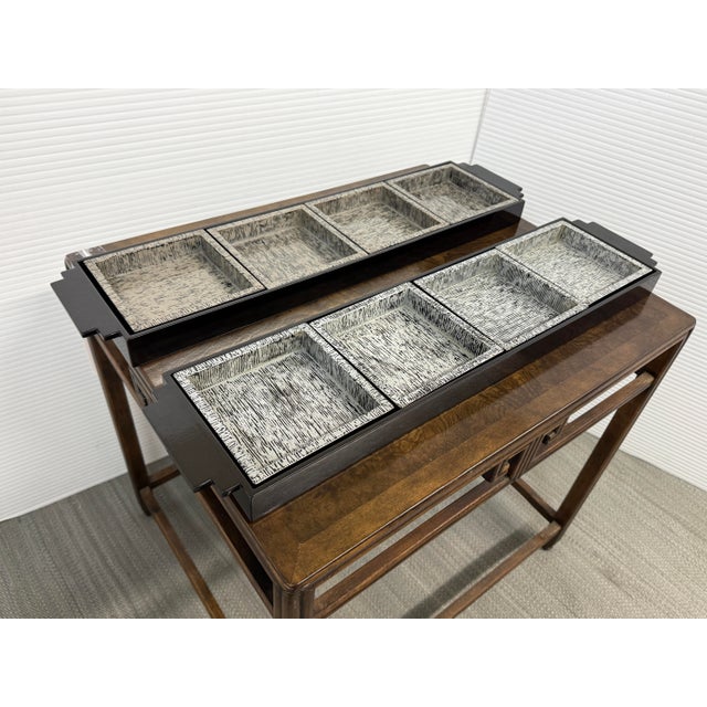 Design Plus Gallery presents a Pair of Lacquered Trays with Removable Plates. The trays are oblong with four speckled...