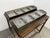 Design Plus Gallery presents a Pair of Lacquered Trays with Removable Plates. The trays are oblong with four speckled...