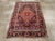This Early 20th century Persian Sarouk rug, measuring 3' 5" x 6' 6", is a superb example of the artistry and elegance that...