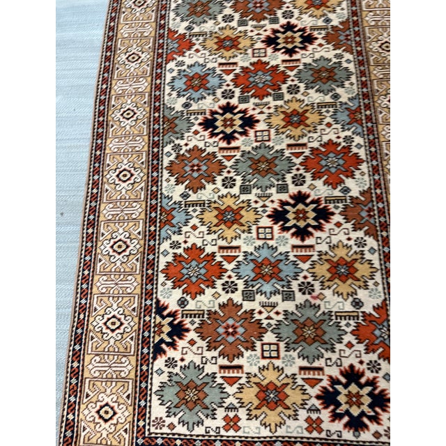 Design Plus Gallery presents a 3ft x 5ft 2in Kaiseri Area Rug from Turkey. The hand-knotted tribal rug features a playful,...