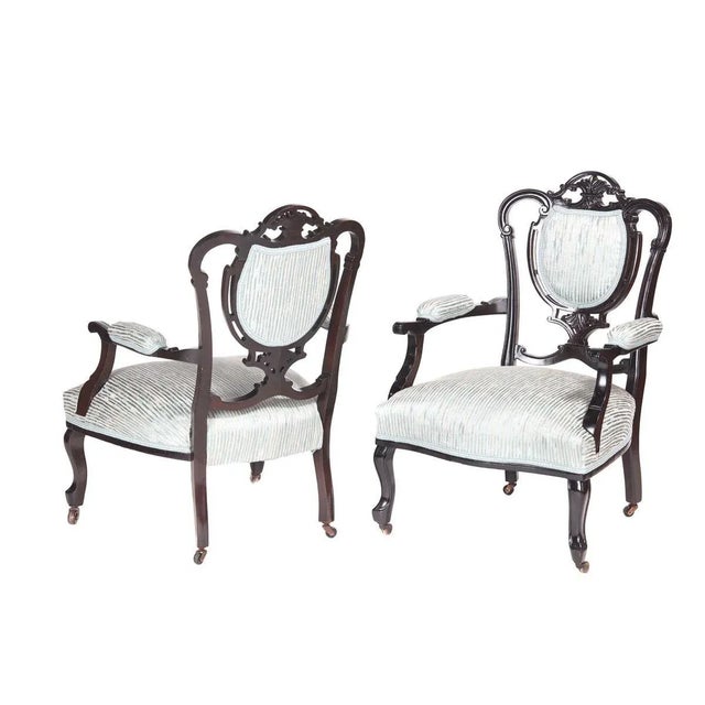 Pair of antique 19th century Victorian carved black lacquered library chairs, with lovely carved and shaped backs, shaped...