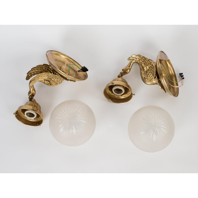 Metal 1950s Spanish Empire Chased Brass Swan Wall Sconces With Starburst Frosted Globes - A Pair For Sale - Image 7 of 13