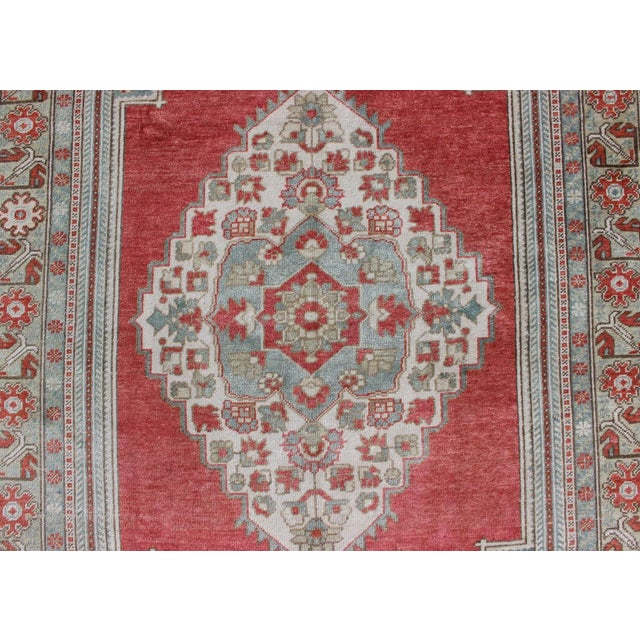 Mid 20th Century Vintage Turkish Oushak Rug With Medallion Design in Coral Pink and Light Blue For Sale In Atlanta - Image 6 of 11