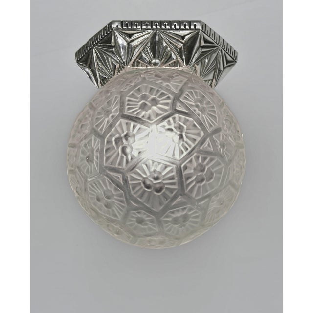 Francis Hubens & Jean Gauthier A beautiful French art deco flush mount made around 1928-1933. The base in nickel plated...