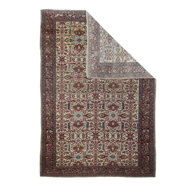 Ivory is probably the most popular Farahan Sarouk ground tone, and this example features a color tending slightly toward...