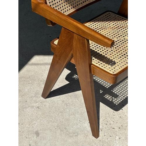 Caned office armchair in natural wood, Asian teak. Total height: 77.5cm; width: 51cm; seat depth: 46cm; seat height: 43 cm...