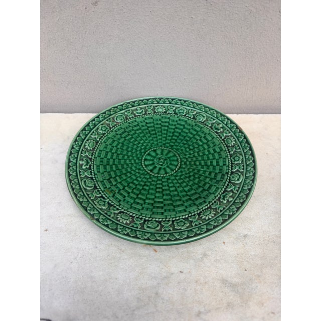 English Green Majolica plate Circa 1890. Hairline.