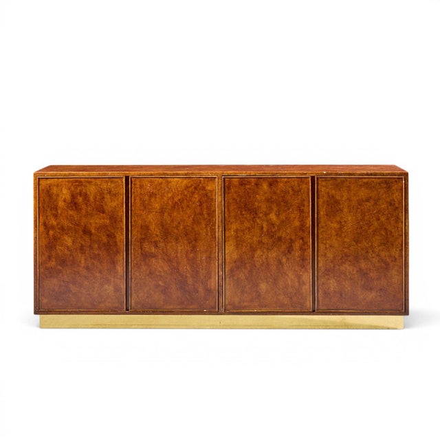 John Widdicomb Mid Century Burlwood and Brass Credenza This credenza measures: 76 wide x 19 deep x 32 inches high Good...