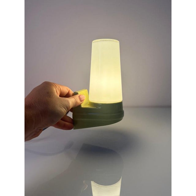 A coveted classic: the model 6080 wall lamp, designed by sigvard bernadotte for ifö, adds a wonderful splash of color to...