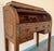 A very good quality late 19th century satinwood Sheraton revival cylinder bureau with ebony string inlay, five walnut...