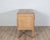 This charming commode is crafted in light-toned wood and reflects the refined yet approachable elegance associated with...