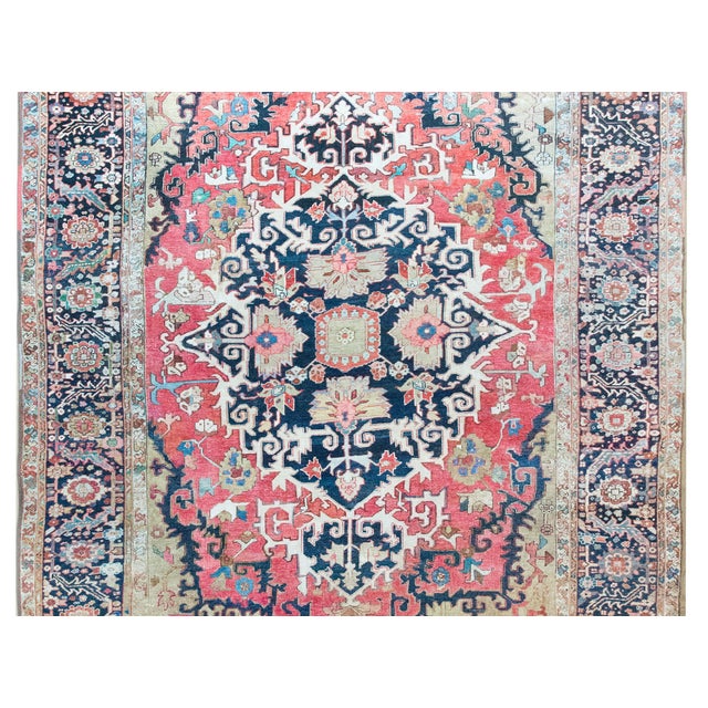 A remarkable late 19th century Persian Serapi rug with the most wonderful and mesmerizing medallion with stylized...