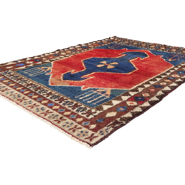 78852 Vintage Persian Lori Rug, 05'06 x 07'03. This captivating hand-knotted wool vintage Persian Lori rug exudes a charm...