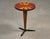 A mid century modern red and orange ceramic side table by Aldo Londi Bitossi. Solid cherry shaft and iron legs. Circa...