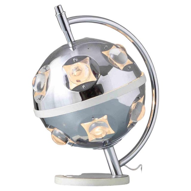 Table Lamp by Oscar Torlasco, 1970s. Chromed Metal, Cut Glass. Produced by LUMI. Cm. 47.3 h. Good general condition,...