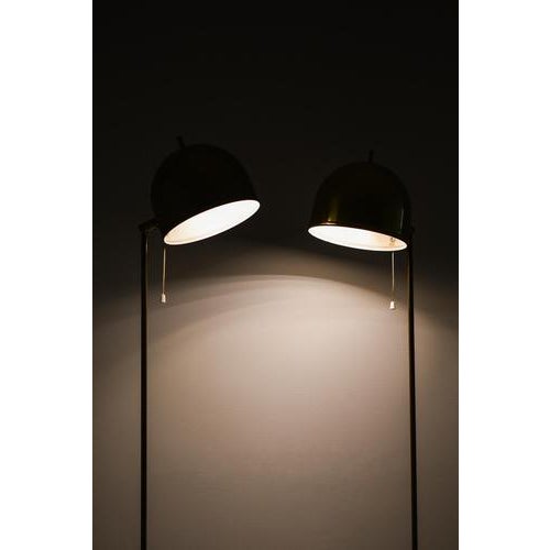 This rare pair of floor lamps, model g-075, designed by eje ahlgren and produced by bergboms in sweden during the 1950s,...