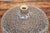 An artisan handmade brown glazed ceramic vase with textured cream strokes. This artisan handmade brown glazed ceramic...