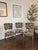 A striking set of three vintage chrome dinette chairs, personally restored and reupholstered in bold tan-and-black tiger...