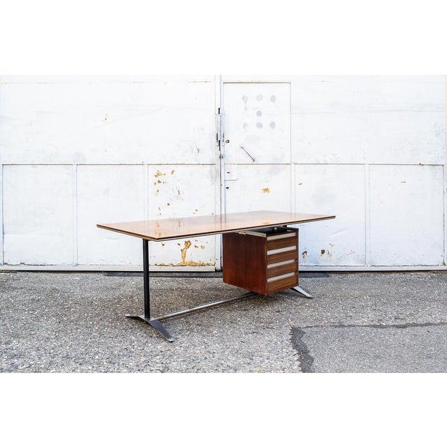 Tecniform desk with chromed and lacquered metal structure, top and wooden chest. Made for the Pirelli skyscraper....