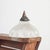 A vintage bell shaped glass prismatic pendant light shade which looks great both lit and unlit. The light has retained its...