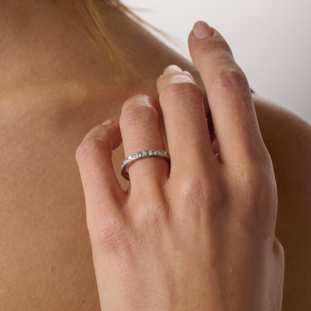 This Edwardian antique French cut diamond eternity band is a beautifully refined jewel from the 1910’s, crafted in...