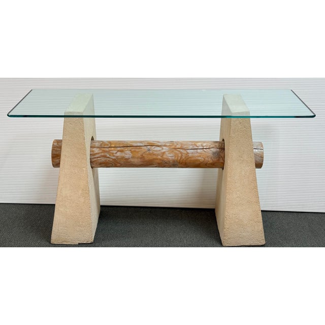 Design Plus Gallery presents a Hand Plastered Console Table with Glass Table Top. The table has two heavy plaster base...