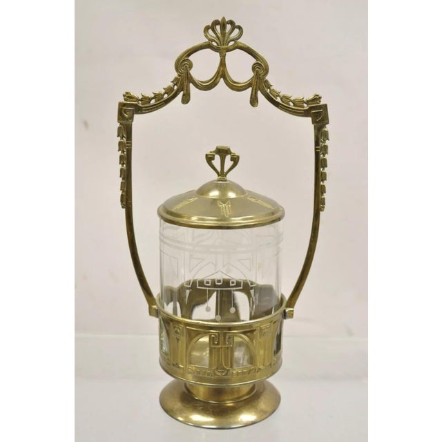 Antique German Art Nouveau Brass Metal Pickle Castor w/ Etched Glass Insert. Circa Early 20th Century. Measurements: 14" H...