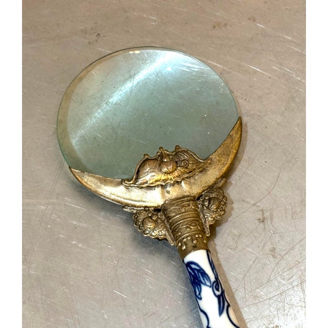 Stunning antique Delftware blue/white ceramic handle magnifying glass/loupe with silver tone ornate detail at neck/base of...