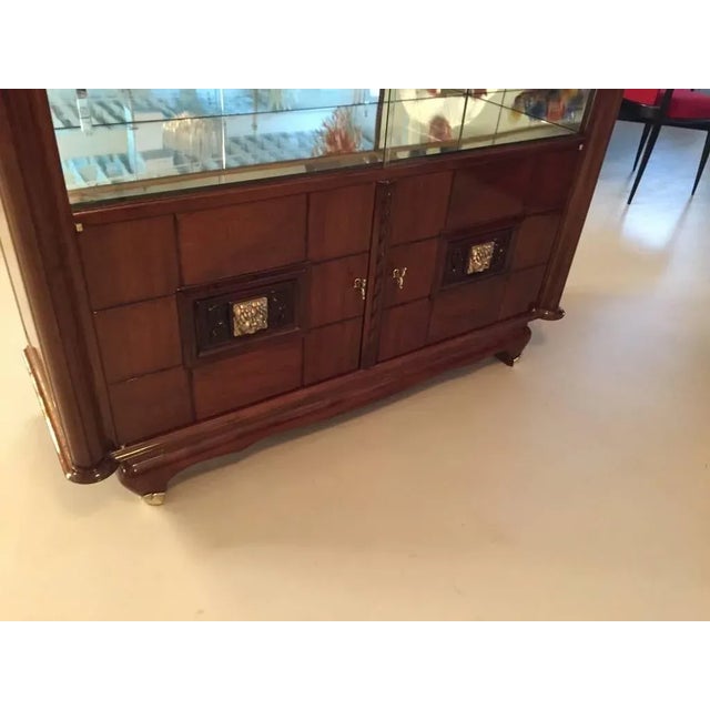 Stunning French Art Deco bronze face walnut vitrine / dry bar. This dry bar has been professionally refinished having a...
